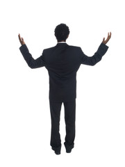 businessman raising his arms in disbelief