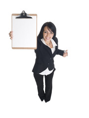 businesswoman presenting a blank clipboard.