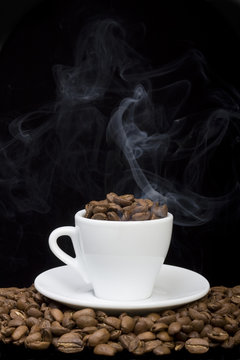 Cup of coffee beans close-up