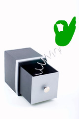 Symbol of hand appears from the open box