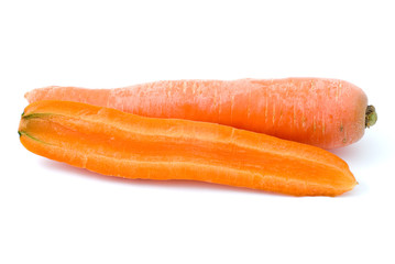 Ripe fresh long carrot and half isolated on the white background