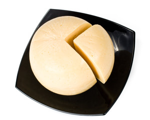 Fresh appetizing cheese on a white background