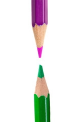 Two pencils confronted on a white background
