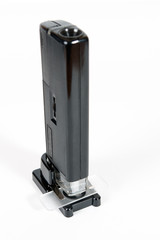 Pocket microscope on white background