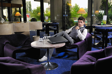 young adult working on laptop