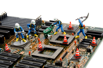 construction site - little workers repairing motherboard