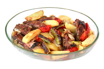 Lamb shanks on the bone cooked with potatoes and pepper