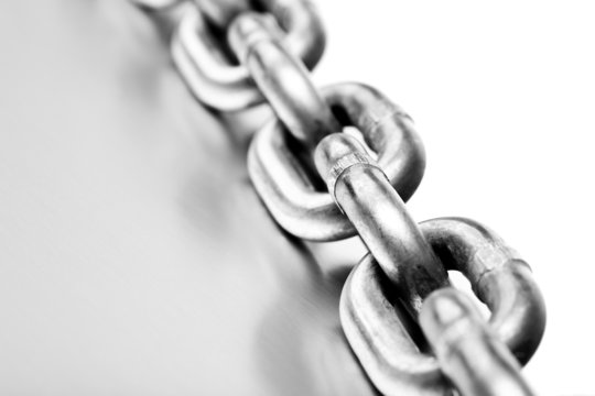 chain macro on brushed metal with white background