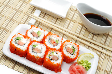 Rolls with Caviar serve with Soy Sauce and Chopsticks