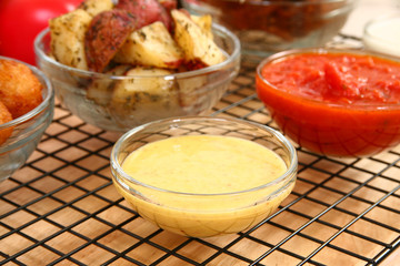 Honey mustard in bowl in kitchen or restaurant.