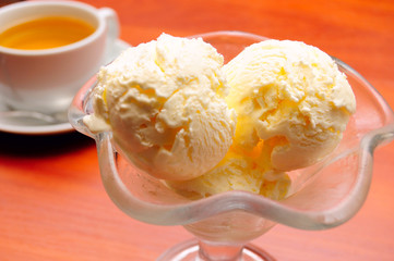 close-up of cup of tea and ice cream, shallow DOF