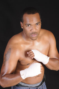 young African American man during boxing workout