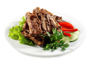 Beef (or Pork) Grilled with Greens and Vegetables on a Plate
