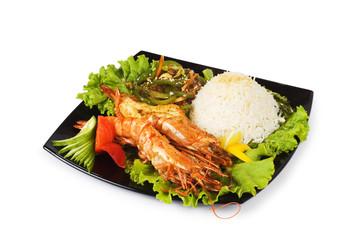 Grilled lobster, rice and vegetables isolated on white