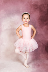 Young dancer wearing a tutu and tiara