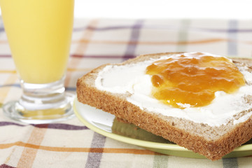 Toast with jam with soft shadow on background. Shallow DOF