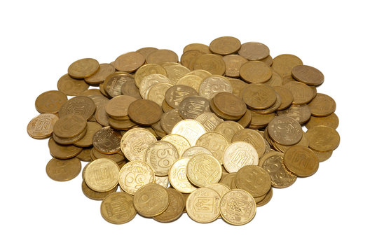 Bunch of gold coins isolated on white.