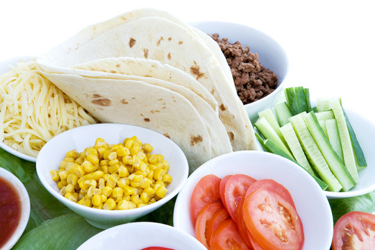 A Layout Of Taco Ingredients Isolated On White