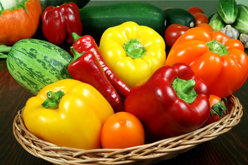 Fresh vegetables in basket on the table.