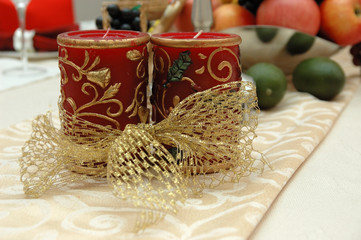 Christmas candles and ornament on dinner table
