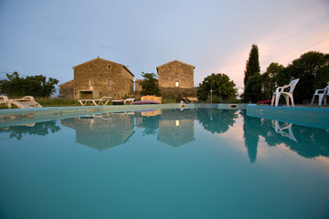 an empty swimming pool at sunset france
