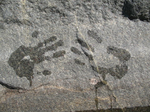 Wet handprint on the stone