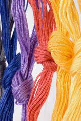 Several hanging buns of color sewing