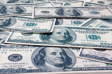 A lot of dollars in hands