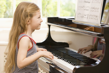Young Girl Playing Piano