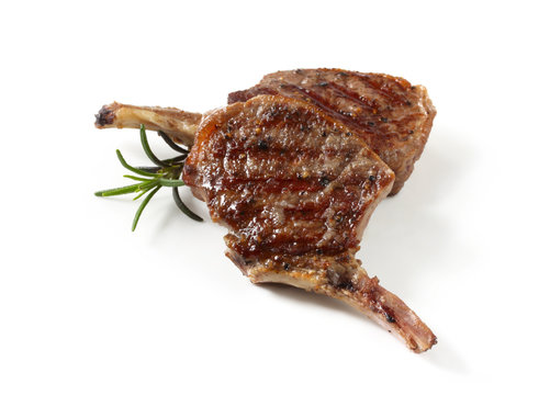 Grilled lamb cutlets with a rosemary sprig
