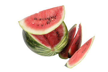 Fresh watermelon with slices lying on white background