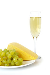 Cheese, grapes and wine isolated on a white background