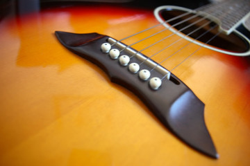 Fototapeta premium an abstract close up of an acoustic guitar