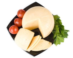 Fresh appetizing cheese on a white background