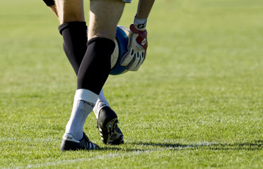 Fototapeta premium Goalkeeper kicking the ball