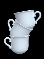 three porcelain coffee cups pile isolated on black background