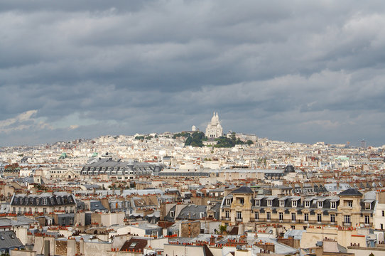 Roofs of Paris with Basilique du Sacre Coeur in background