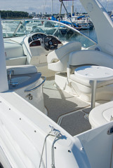 Obraz premium White motor boat in a Marina