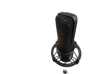 Black microphone isolated on white. Shot with wide lens.