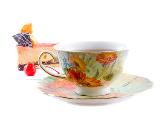 Fototapeta premium Cake and tea. Isolation on the white
