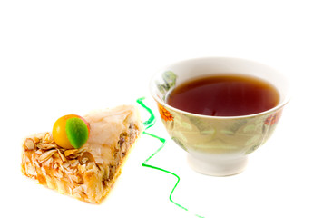 Cake and tea. Isolation on the white