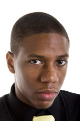 Fototapeta premium A good looking young black man in black shirt with yellow tie