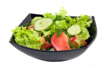 Fresh vegetables salad on a white background