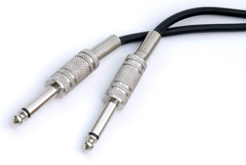 Black Audio Cables on an Isolated White Background