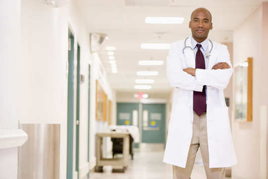 Doctor Standing In A Hospital Corridor