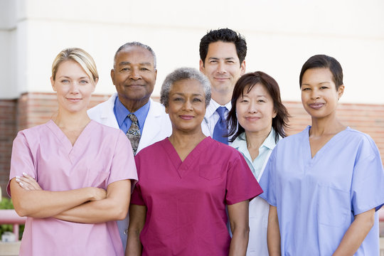 Hospital Staff Standing Outside A Hospital