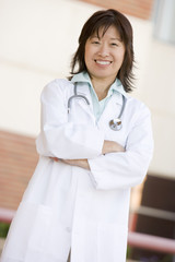 Doctor Standing Outside A Hospital