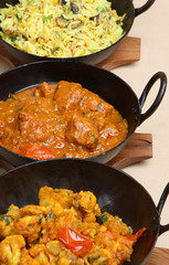 Indian curries in korai dishes.