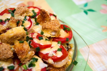 fried potato and tomato in plate