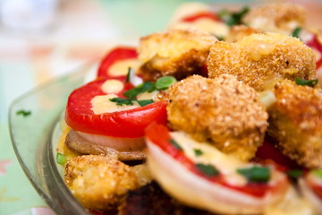fried potato and tomato in plate